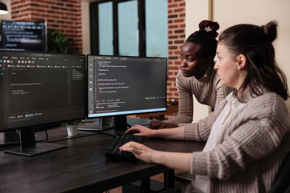 Software developers working in a software house